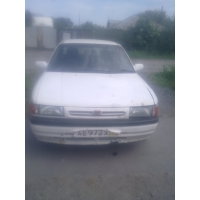 Продам а/м Mazda Familia требующий покраски
