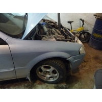 Продам а/м Mazda Familia битый