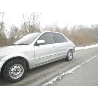Продам а/м Mazda Familia битый