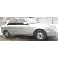 Продам а/м Mazda Familia битый