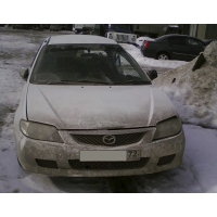 Продам а/м Mazda Familia битый