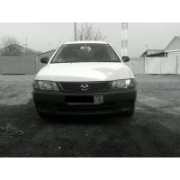 Продам а/м Mazda Familia битый