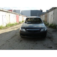 Продам а/м Mazda Familia требующий покраски